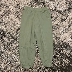 Green sweatpants with floral design